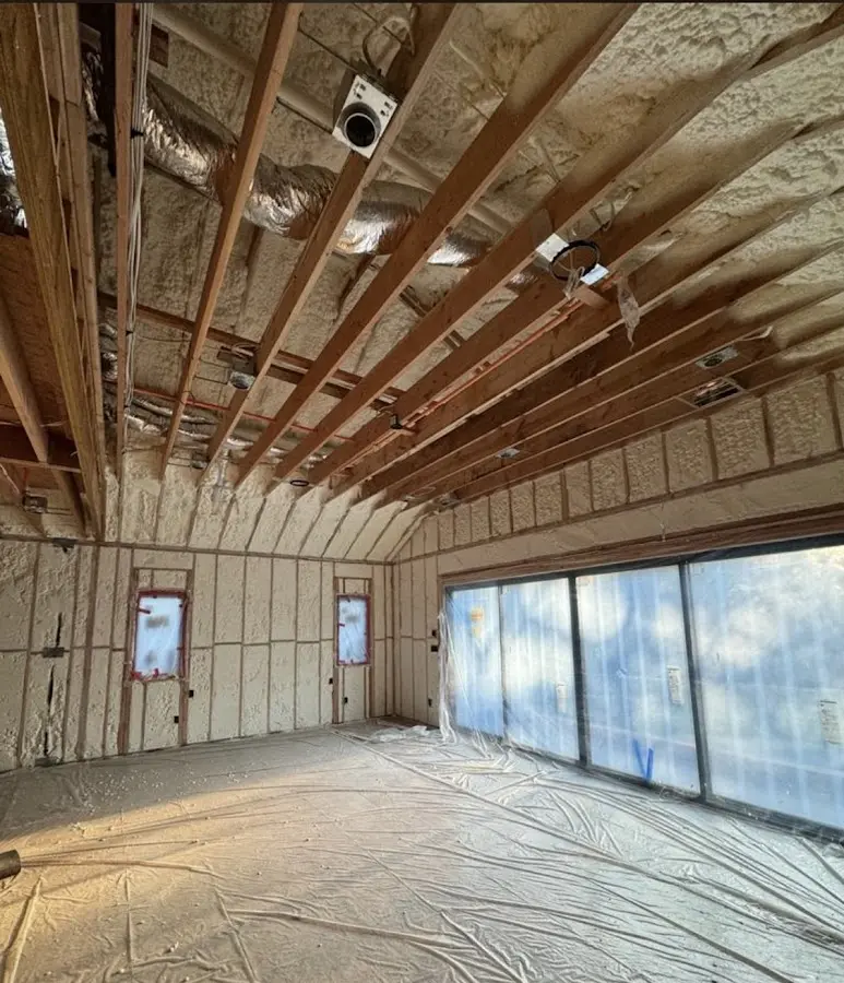 Interior walls and ceiling insulated with spray foam during new construction in Bell Gardens